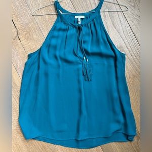 Pretty turquoise color.  Cute and versatile!